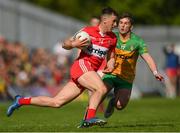 29 May 2022; Shane McGuigan of Derry in action against Peadar Mogan of Donegal during the Ulster GAA Football Senior Championship Final between Derry and Donegal at St Tiernach's Park in Clones, Monaghan. Photo by Stephen McCarthy/Sportsfile