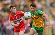 29 May 2022; Peadar Mogan of Donegal in action against Padraig McGrogan of Derry during the Ulster GAA Football Senior Championship Final between Derry and Donegal at St Tiernach's Park in Clones, Monaghan. Photo by Stephen McCarthy/Sportsfile