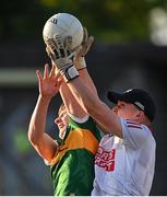 1 June 2022; Cork goalkeeper Josh Woods in action against Ian O'Sullivan of Kerry during the Electric Ireland Munster GAA Minor Football Championship Final match between Kerry and Cork at Páirc Uí Rinn in Cork. Photo by Piaras Ó Mídheach/Sportsfile