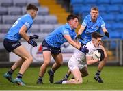 18 May 2022; Eoin Cully of Kildare in action against Dublin players, from left, David Lucey, Emmet Brady and Ryan Mitchell during the Electric Ireland Leinster GAA Minor Football Championship Final match between Dublin and Kildare at MW Hire O'Moore Park in Portlaoise, Laois. Photo by Stephen McCarthy/Sportsfile