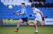 18 May 2022; Clyde Burke of Dublin in action against James Harris of Kildare during the Electric Ireland Leinster GAA Minor Football Championship Final match between Dublin and Kildare at MW Hire O'Moore Park in Portlaoise, Laois. Photo by Stephen McCarthy/Sportsfile