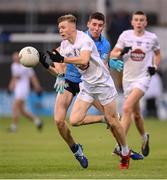 18 May 2022; Tom Kelly of Kildare in action against Nathan Fitzgerald of Dublin during the Electric Ireland Leinster GAA Minor Football Championship Final match between Dublin and Kildare at MW Hire O'Moore Park in Portlaoise, Laois. Photo by Stephen McCarthy/Sportsfile