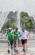 3 June 2022; Republic of Ireland supporters run through a water feature at Yerevan 2800th Anniversary Park in Yerevan, ahead of their side's UEFA Nations League match against Armenia on Saturday at the Vazgen Sargsyan Republican Stadium. Photo by Stephen McCarthy/Sportsfile