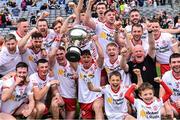 21 May 2022; Seán Paul McKernan of Tyrone holds the cup aloft as he celebrates with teammates after their side's victory in the Nickey Rackard Cup Final match between Roscommon and Tyrone at Croke Park in Dublin. Photo by Piaras Ó Mídheach/Sportsfile
