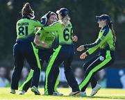 3 June 2022; Arlene Kelly of Ireland, centre, celebrates with team-mates, from left, Mary Waldron, Gaby Lewis and Shauna Kavanagh after catching and bowling Tazmin Brits of South Africa during the Women's T20 International match between Ireland and South Africa at Pembroke Cricket Club in Dublin. Photo by Sam Barnes/Sportsfile