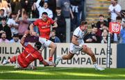 3 June 2022; Stewart Moore of Ulster runs in to score his side's second try despite the attempts of Andrew Conway, centre, and Josh Wycherley of Munster during the United Rugby Championship Quarter-Final match between Ulster and Munster at Kingspan Stadium in Belfast. Photo by Ben McShane/Sportsfile