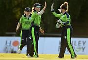 3 June 2022; Ireland players, from left, Celeste Raack, Leah Paul, and Mary Waldron celebrate their side's victroy in the Women's T20 International match between Ireland and South Africa at Pembroke Cricket Club in Dublin. Photo by Sam Barnes/Sportsfile