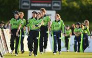 3 June 2022; Ireland players including Cara Murray, centre, after their side's victory in the Women's T20 International match between Ireland and South Africa at Pembroke Cricket Club in Dublin. Photo by Sam Barnes/Sportsfile
