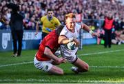 3 June 2022; Stewart Moore of Ulster scores his side's third try despite the tackle of Josh Wycherley of Munster during the United Rugby Championship Quarter-Final match between Ulster and Munster at Kingspan Stadium in Belfast. Photo by Ben McShane/Sportsfile