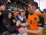 3 June 2022; Republic of Ireland captain Conor Coventry with supporters after his side's victory in the UEFA European U21 Championship qualifying group F match between Republic of Ireland and Bosnia and Herzegovina at Tallaght Stadium in Dublin. Photo by Seb Daly/Sportsfile