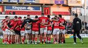 3 June 2022; Munster head coach Johann van Graan joins the Munster team huddle after the United Rugby Championship Quarter-Final match between Ulster and Munster at Kingspan Stadium in Belfast. Photo by Ramsey Cardy/Sportsfile