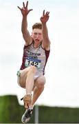 4 June 2022; Evan Hallinan of Presentation Athenry, Galway, on his way to finishing second in the senior boys triple jump at the Irish Life Health All Ireland Schools Track and Field Championships at Tullamore in Offaly. Photo by Sam Barnes/Sportsfile