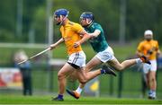 4 June 2022; Cathal Kirby of Wicklow Gold in action against Noah Farrell of Kildare Lilywhites during the Electric Ireland Challenge Corn Tom Hogan Final match between Wicklow Gold and Kildare Lilywhites at the National Games Development Centre in Abbotstown, Dublin. Photo by Ben McShane/Sportsfile