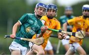 4 June 2022; Mark Kiernan of Kildare Lilywhites in action against Oisin O'Neill of Wicklow Gold during the Electric Ireland Challenge Corn Tom Hogan Final match between Wicklow Gold and Kildare Lilywhites at the National Games Development Centre in Abbotstown, Dublin. Photo by Ben McShane/Sportsfile