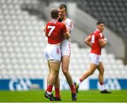 4 June 2022; Conor Early of Louth tussles with Mattie Taylor of Cork during the GAA Football All-Ireland Senior Championship Round 1 match between Cork and Louth at Páirc Ui Chaoimh in Cork. Photo by Eóin Noonan/Sportsfile