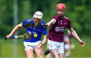4 June 2022; Robbie Ryan of Tipperary in action against David Mannion of Galway during the Electric Ireland Challenge Corn Michael Hogan Final match between Galway and Tipperary at the National Games Development Centre in Abbotstown, Dublin. Photo by Ben McShane/Sportsfile
