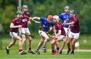 4 June 2022; Kieran Grace of Tipperary in action against Galway players, from left, Niall Feeney, Brian Horan, Ryan Rabbitte and Cillian O'Donovan during the Electric Ireland Challenge Corn Michael Hogan Final match between Galway and Tipperary at the National Games Development Centre in Abbotstown, Dublin. Photo by Ben McShane/Sportsfile