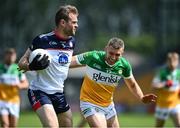 4 June 2022; Jonathan Glynn of New York in action against Anton Sullivan of Offaly during the Tailteann Cup Quarter-Final match between Offaly and New York at O'Connor Park in Tullamore, Offaly. Photo by David Fitzgerald/Sportsfile