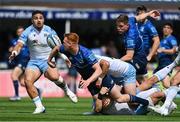 4 June 2022; Ciarán Frawley of Leinster offloads while being tackled by Ross Thompson and Sam Johnson of Glasgow Warriors during the United Rugby Championship Quarter-Final match between Leinster and Glasgow Warriors at RDS Arena in Dublin. Photo by Brendan Moran/Sportsfile
