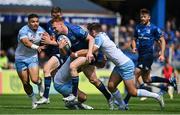 4 June 2022; Ciarán Frawley of Leinster is tackled by Ross Thompson and Sam Johnson of Glasgow Warriors during the United Rugby Championship Quarter-Final match between Leinster and Glasgow Warriors at RDS Arena in Dublin. Photo by Brendan Moran/Sportsfile