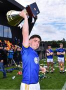 4 June 2022; Tipperary captain Daniel Rossiter lifts the cup after the Electric Ireland Challenge Corn Michael Hogan Final match between Galway and Tipperary at the National Games Development Centre in Abbotstown, Dublin. Photo by Ben McShane/Sportsfile