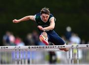 4 June 2022; Adam Nolan of Scoil Chonglais Baltinglass, Wicklow, on his way to winning the senior boys 110m hurdles at the Irish Life Health All Ireland Schools Track and Field Championships at Tullamore in Offaly. Photo by Sam Barnes/Sportsfile