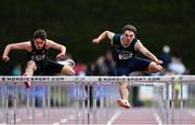 4 June 2022; Adam Nolan of Scoil Chonglais Baltinglass, Wicklow, right, on his way to winning the senior boys 110m hurdles at the Irish Life Health All Ireland Schools Track and Field Championships at Tullamore in Offaly. Photo by Sam Barnes/Sportsfile