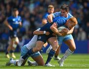 4 June 2022; Ciarán Frawley of Leinster is tackled by Ross Thompson and Sam Johnson of Glasgow Warriors during the United Rugby Championship Quarter-Final match between Leinster and Glasgow Warriors at RDS Arena in Dublin. Photo by Harry Murphy/Sportsfile