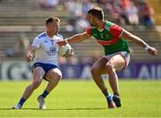 4 June 2022; Ryan McAnespie of Monaghan in action against Aidan O'Shea of Mayo during the GAA Football All-Ireland Senior Championship Round 1 match between Mayo and Monaghan at Hastings Insurance MacHale Park in Castlebar, Mayo. Photo by Piaras Ó Mídheach/Sportsfile