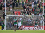 4 June 2022; Cillian O'Connor of Mayo, 15, scores his side's first goal, from a penalty, past Monaghan goalkeeper Rory Beggan during the GAA Football All-Ireland Senior Championship Round 1 match between Mayo and Monaghan at Hastings Insurance MacHale Park in Castlebar, Mayo. Photo by Piaras Ó Mídheach/Sportsfile