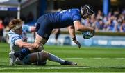 4 June 2022; Caelan Doris of Leinster scores his side's fifth try despite the tackle of Rob Harley of Glasgow Warriors during the United Rugby Championship Quarter-Final match between Leinster and Glasgow Warriors at RDS Arena in Dublin. Photo by Brendan Moran/Sportsfile