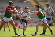 4 June 2022; Ryan McAnespie of Monaghan in action against Mayo players Aidan O'Shea, left, and Matthew Ruane during the GAA Football All-Ireland Senior Championship Round 1 match between Mayo and Monaghan at Hastings Insurance MacHale Park in Castlebar, Mayo. Photo by Piaras Ó Mídheach/Sportsfile