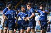 4 June 2022; Garry Ringrose of Leinster celebrates with teammates Jordan Larmour and Ross Byrne after scoring their side's eighth try during the United Rugby Championship Quarter-Final match between Leinster and Glasgow Warriors at RDS Arena in Dublin. Photo by Brendan Moran/Sportsfile