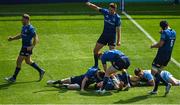 4 June 2022; Garry Ringrose of Leinster celebrates with teammates including Jordan Larmour and Ross Byrne after scoring his side's eighth try during the United Rugby Championship Quarter-Final match between Leinster and Glasgow Warriors at RDS Arena in Dublin. Photo by Harry Murphy/Sportsfile