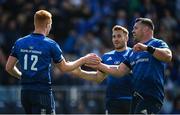 4 June 2022; Ciarán Frawley of Leinster celebrates with teammates Cian Healy and Jordan Larmour after scoring his side's tenth try during the United Rugby Championship Quarter-Final match between Leinster and Glasgow Warriors at RDS Arena in Dublin. Photo by Harry Murphy/Sportsfile