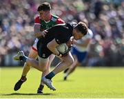 4 June 2022; Monaghan goalkeeper Rory Beggan is tackled by James Carr of Mayo during the GAA Football All-Ireland Senior Championship Round 1 match between Mayo and Monaghan at Hastings Insurance MacHale Park in Castlebar, Mayo. Photo by Piaras Ó Mídheach/Sportsfile