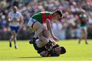 4 June 2022; Monaghan goalkeeper Rory Beggan is tackled by James Carr of Mayo during the GAA Football All-Ireland Senior Championship Round 1 match between Mayo and Monaghan at Hastings Insurance MacHale Park in Castlebar, Mayo. Photo by Piaras Ó Mídheach/Sportsfile