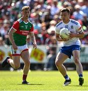 4 June 2022; Conor McCarthy of Monaghan in action against Aiden Orme of Mayo during the GAA Football All-Ireland Senior Championship Round 1 match between Mayo and Monaghan at Hastings Insurance MacHale Park in Castlebar, Mayo. Photo by Piaras Ó Mídheach/Sportsfile