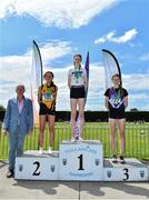 4 June 2022; President of the Irish Schools Athletic Association Billy Delaney, with junior girls high jump medallists, from left, Danielle Moynihan of Holy Rosary College, Galway, silver, Tara O’Connor of St Vincents Dundalk, Louth, gold, and Ellis McHugh of Waterpark College, Waterford, bronze,, at the Irish Life Health All Ireland Schools Track and Field Championships at Tullamore in Offaly. Photo by Sam Barnes/Sportsfile