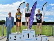 4 June 2022; President of the Irish Schools Athletic Association Billy Delaney, with junior girls high jump medallists, from left, Danielle Moynihan of Holy Rosary College, Galway, silver, Tara O’Connor of St Vincents Dundalk, Louth, gold, and Ellis McHugh of Waterpark College, Waterford, bronze,, at the Irish Life Health All Ireland Schools Track and Field Championships at Tullamore in Offaly. Photo by Sam Barnes/Sportsfile