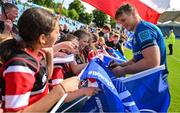 4 June 2022; Josh van der Flier of Leinster signs autographs for young players from Wicklow RFC after the United Rugby Championship Quarter-Final match between Leinster and Glasgow Warriors at RDS Arena in Dublin. Photo by Brendan Moran/Sportsfile