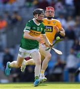 4 June 2022; Colin Walsh of Kerry races clear of James McNaughton of Antrim  during the Joe McDonagh Cup Final match between Antrim and Kerry at Croke Park in Dublin. Photo by Ray McManus/Sportsfile