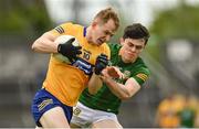 4 June 2022; Pearse Lillis of Clare in action against Eoin Harkin of Meath during the GAA Football All-Ireland Senior Championship Round 1 match between Clare and Meath at Cusack Park in Ennis, Clare. Photo by Seb Daly/Sportsfile