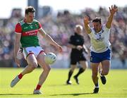 4 June 2022; Matthew Ruane of Mayo shoots under pressure from Ryan Wylie of Monaghan during the GAA Football All-Ireland Senior Championship Round 1 match between Mayo and Monaghan at Hastings Insurance MacHale Park in Castlebar, Mayo. Photo by Piaras Ó Mídheach/Sportsfile