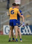 4 June 2022; Clare goalkeeper Tristan O’Callaghan and Ciarán Russell celebrate after their side's victory in the GAA Football All-Ireland Senior Championship Round 1 match between Clare and Meath at Cusack Park in Ennis, Clare. Photo by Seb Daly/Sportsfile