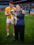 4 June 2022; Domhnall Nugent of Antrim and Domhnall Nugent of Antrimsupporter Eamon Boyle with the cup after the Joe McDonagh Cup Final match between Antrim and Kerry at Croke Park in Dublin. Photo by Ray McManus/Sportsfile