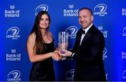 4 June 2022; Ella Roberts is presented with the LAYA Healthcare Women's Young Player of the Year award by D.O. O’Connor of LAYA Healthcare during the Leinster Rugby Awards Ball at The Clayton Hotel Burlington Road in Dublin. The Leinster Rugby Awards Ball was a celebration of the 2021/22 Leinster Rugby season to date. Photo by Brendan Moran/Sportsfile