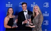 4 June 2022; Michelle Claffey, left, and Josh van der Flier are presented with the Bank of Ireland Women's and Men's Player's Player of the Year awards by Bank of Ireland Chief Marketing Officer Laura Lynch during the Leinster Rugby Awards Ball at The Clayton Hotel Burlington Road in Dublin. The Leinster Rugby Awards Ball was a celebration of the 2021/22 Leinster Rugby season to date. Photo by Brendan Moran/Sportsfile