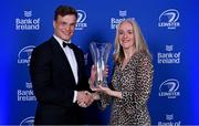 4 June 2022; Josh van der Flier is presented with the Bank of Ireland Mens Player's Player of the Year award by Bank of Ireland Chief Marketing Officer Laura Lynch during the Leinster Rugby Awards Ball at The Clayton Hotel Burlington Road in Dublin. The Leinster Rugby Awards Ball was a celebration of the 2021/22 Leinster Rugby season to date. Photo by Brendan Moran/Sportsfile