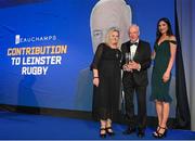 4 June 2022; Ray Ryan is presented with the Beauchamps Contribution to Leinster Rugby award by Beauchamps Associate Sian Browne and incoming Leinster Rugby president Debbie Carty during the Leinster Rugby Awards Ball at The Clayton Hotel Burlington Road in Dublin. The Leinster Rugby Awards Ball was a celebration of the 2021/22 Leinster Rugby season to date. Photo by Harry Murphy/Sportsfile